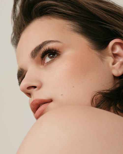 Model wearing volume eyelash extensions.