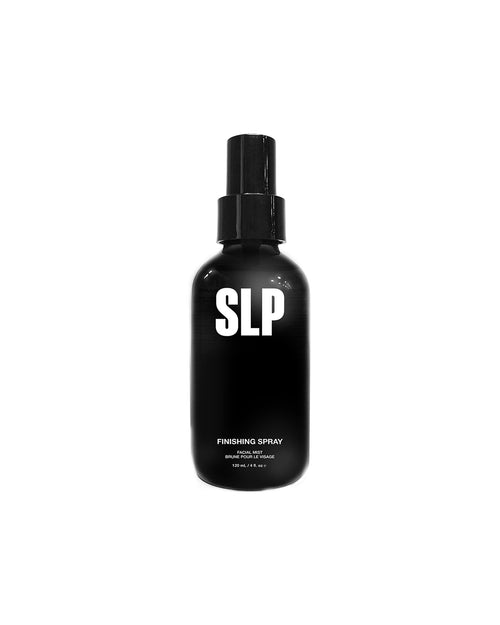 A bottle of Finishing Spray on a white background for skin and eyelash extensions