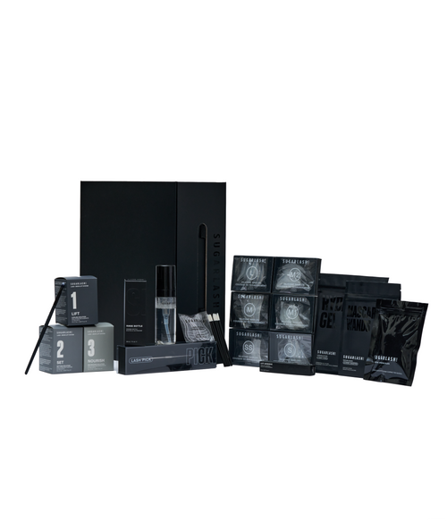 Image of lash lift kit containing lash lift tools, eye pads, gel, and solutions.