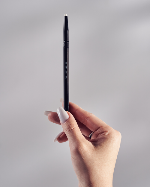 A model holding the Professional Lash Lift Brush.